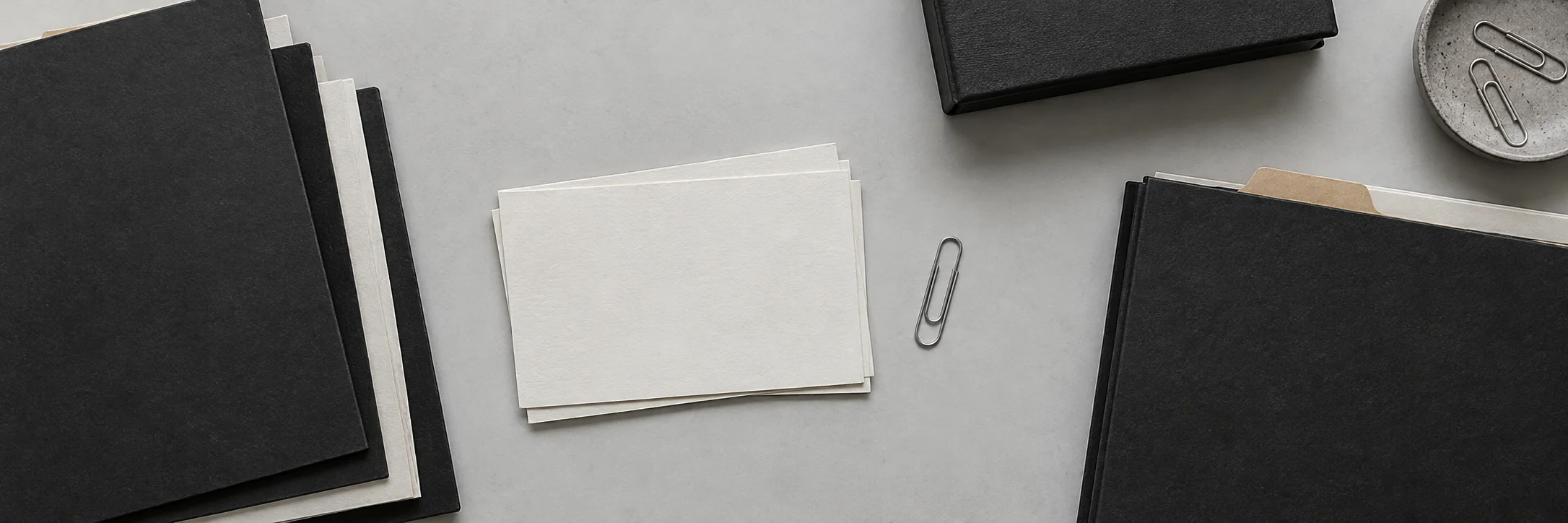 Illustrative still life of archival folders and blank index cards